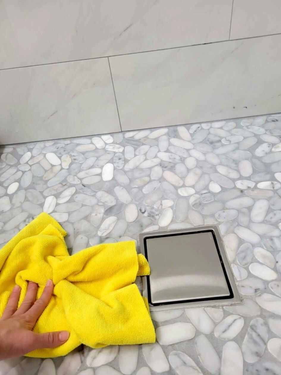Marble shower floor and drain deep cleaned